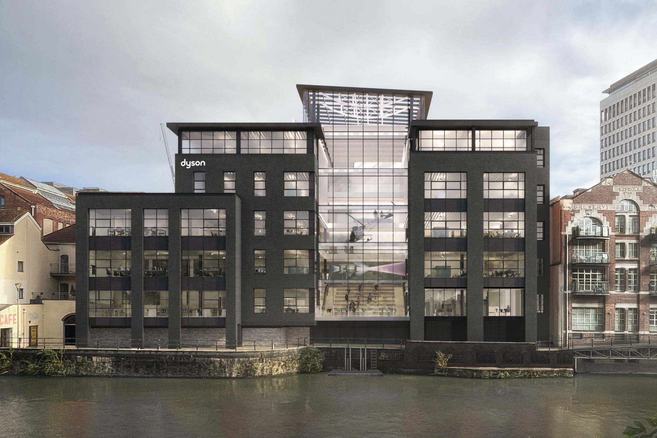 A CGI image of Dyson new offices in Bristol. A large office block with windows and black panelling on the waterfront with the river underneath.