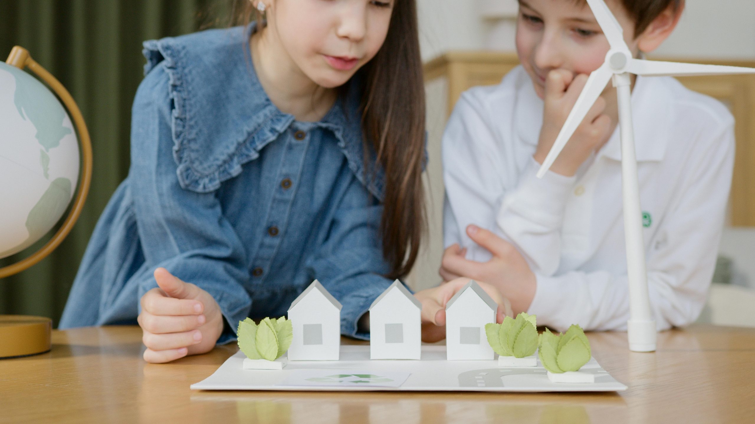 Image Showing Girl & Boy With Paper Houses